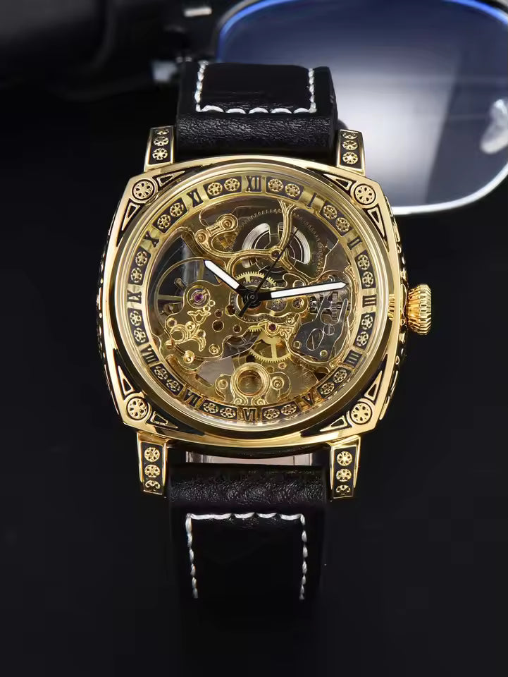 Gold Black — gold-tone automatic skeleton watch with black leather strap