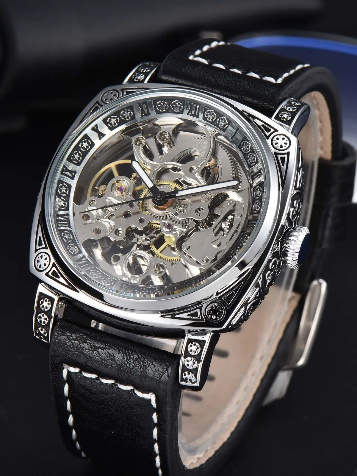Blason automatic skeleton watch by Vallière — silver engraved cushion case on a black leather strap, open dial showing the movement, no name on the dial