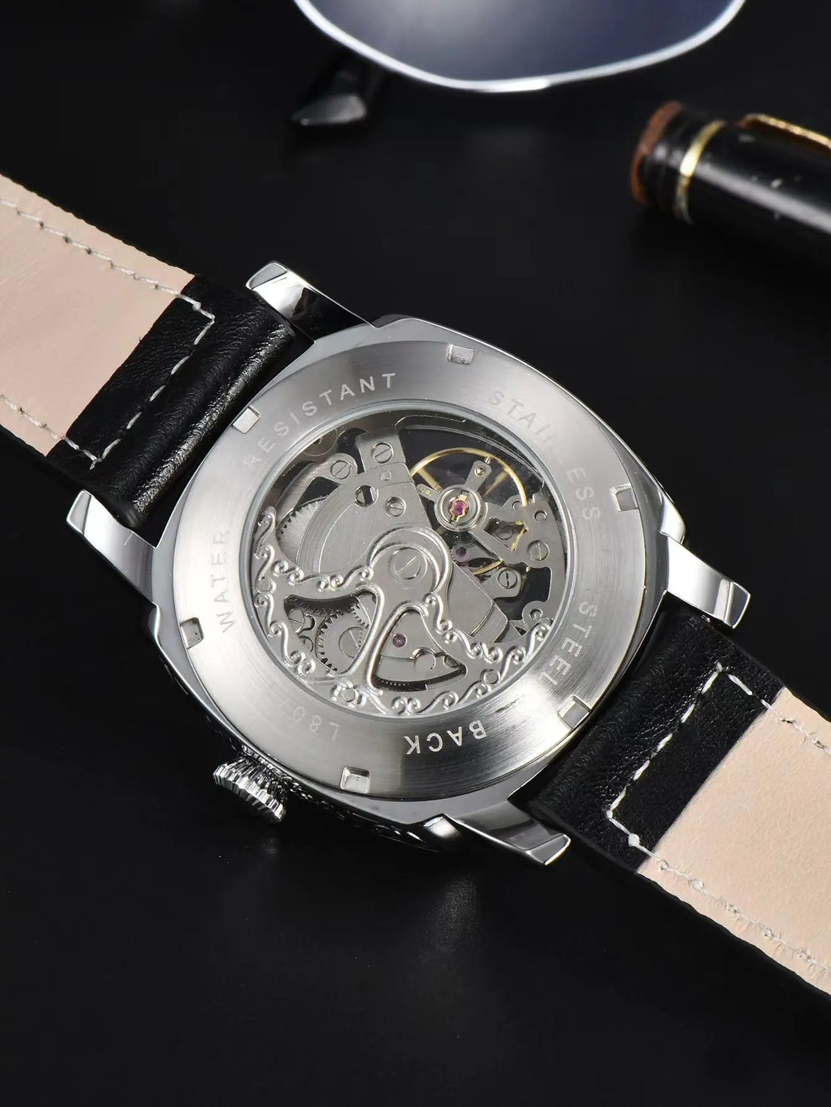 Exhibition caseback showing the mechanical movement through the glass